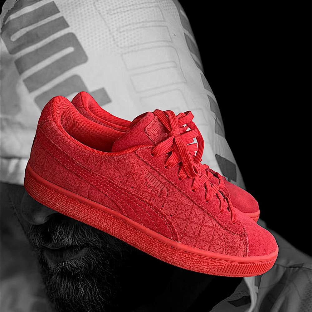Red suede Pumas
